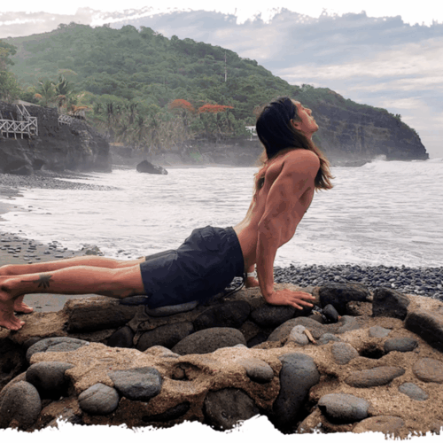 manuel doing yoga on the beach